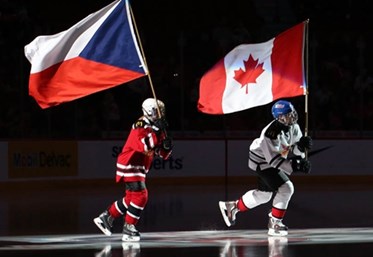 MONTREAL, CANADA - JANUARY 2: Canadian and Czech Republic flag bearers take to the for the opening ceremonies of the quarterfinal round game at the 2017 IIHF World Junior Championship. (Photo by Andre Ringuette/HHOF-IIHF Images)

